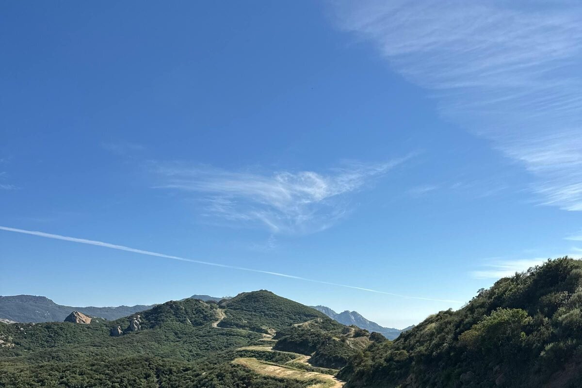 Malibu Creek State Park — Los Angeles Family Photography Location Rolling green hills and golden chaparral valley at Malibu Creek State Park, a stunning Los Angeles family photography location in the Santa Monica Mountains