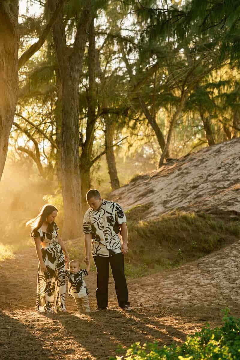 Family in ironwood trees Family walking through ironwood trees at golden hour