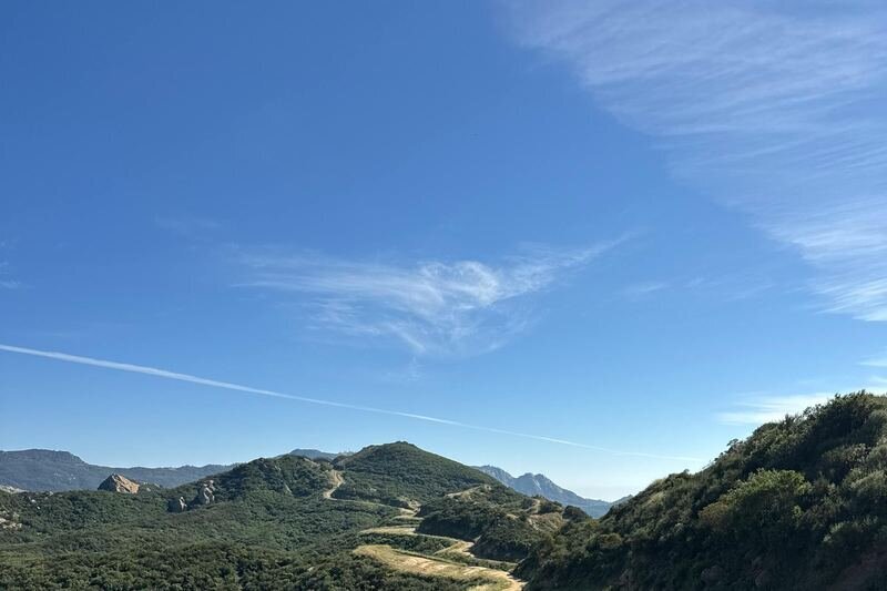 Malibu Creek State Park — Los Angeles Family Photography Location Rolling green hills and golden chaparral valley at Malibu Creek State Park, a stunning Los Angeles family photography location in the Santa Monica Mountains
