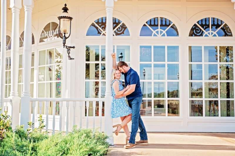 Couple Photoshoot in Orlando Florida — Charming Outdoor Session A couple dancing together in front of a charming white building in Orlando Florida during a romantic photoshoot