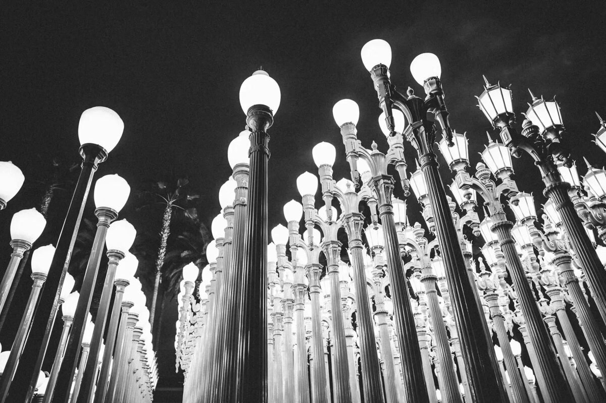 Los Angeles Engagement Photographer — LACMA Urban Light The Urban Light installation at LACMA in Los Angeles illuminated at night, a striking and iconic location for engagement photography