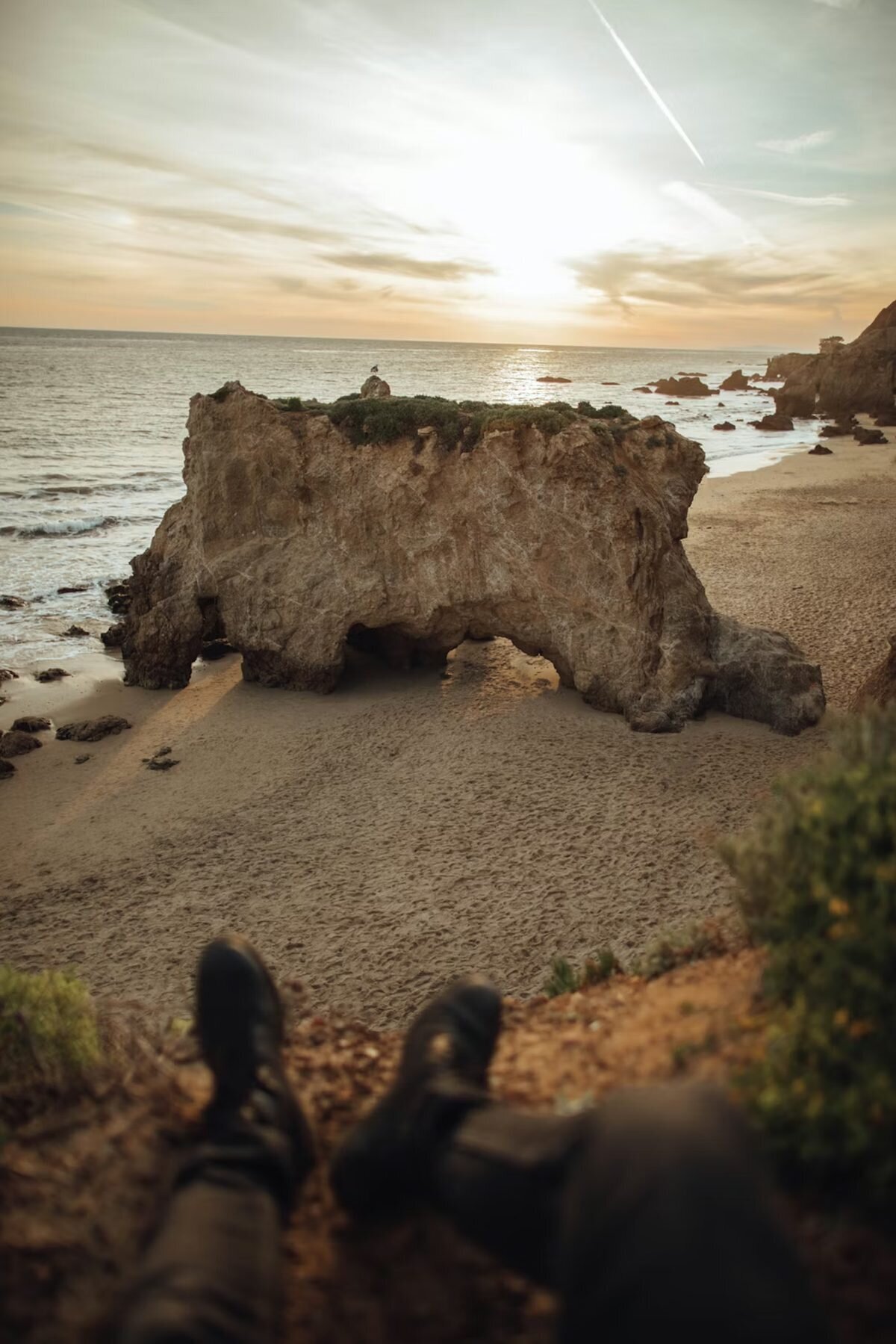 Los Angeles Engagement Photographer — El Matador Beach Malibu Sea stack rock arch at El Matador Beach in Malibu at sunset, a dramatic location for Los Angeles engagement photography
