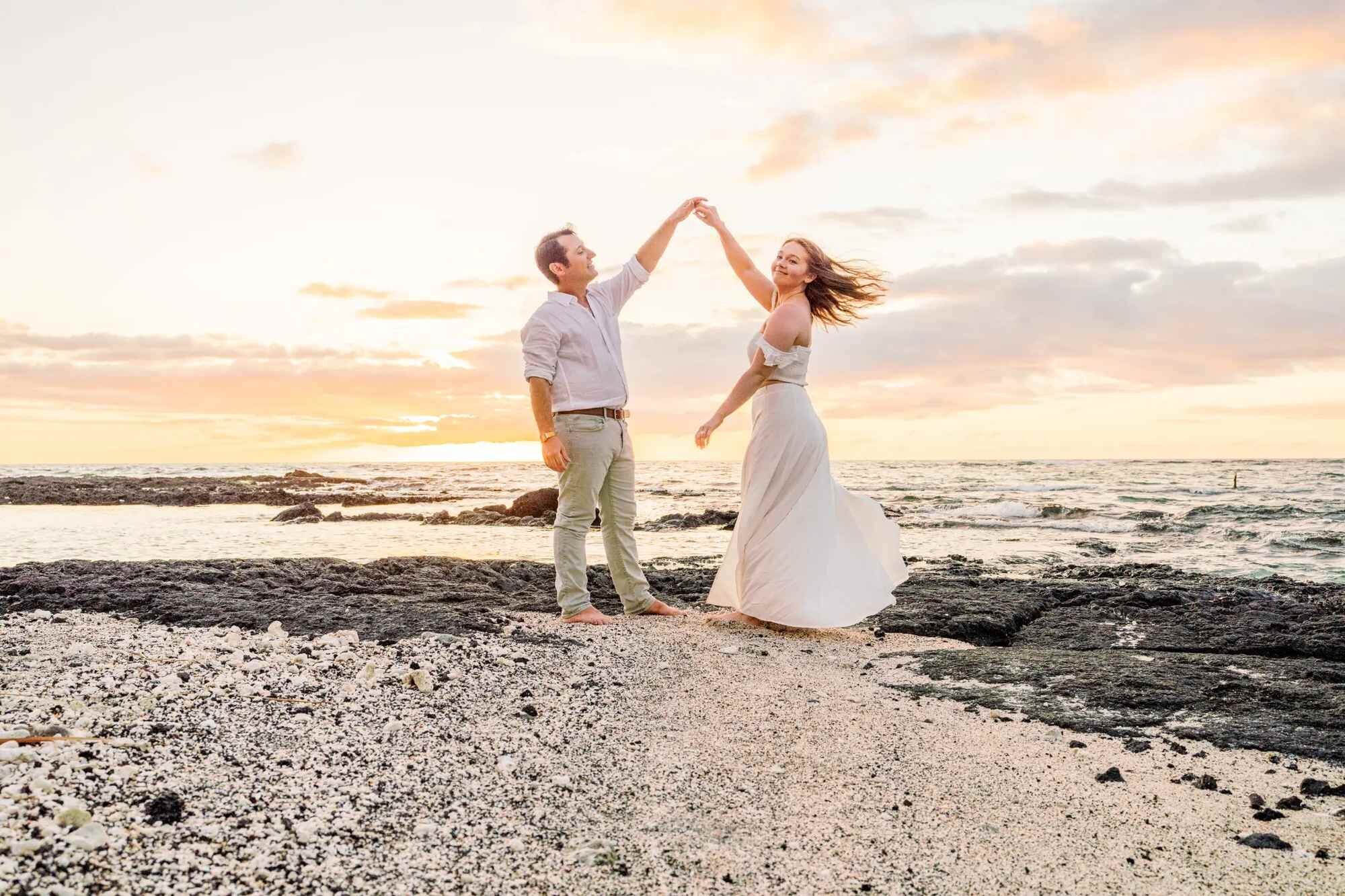 Romantic Couple Dancing at Sunset — Dreamgraphy Photoshoot A couple dancing together on a rocky beach at golden hour during a romantic couple photoshoot
