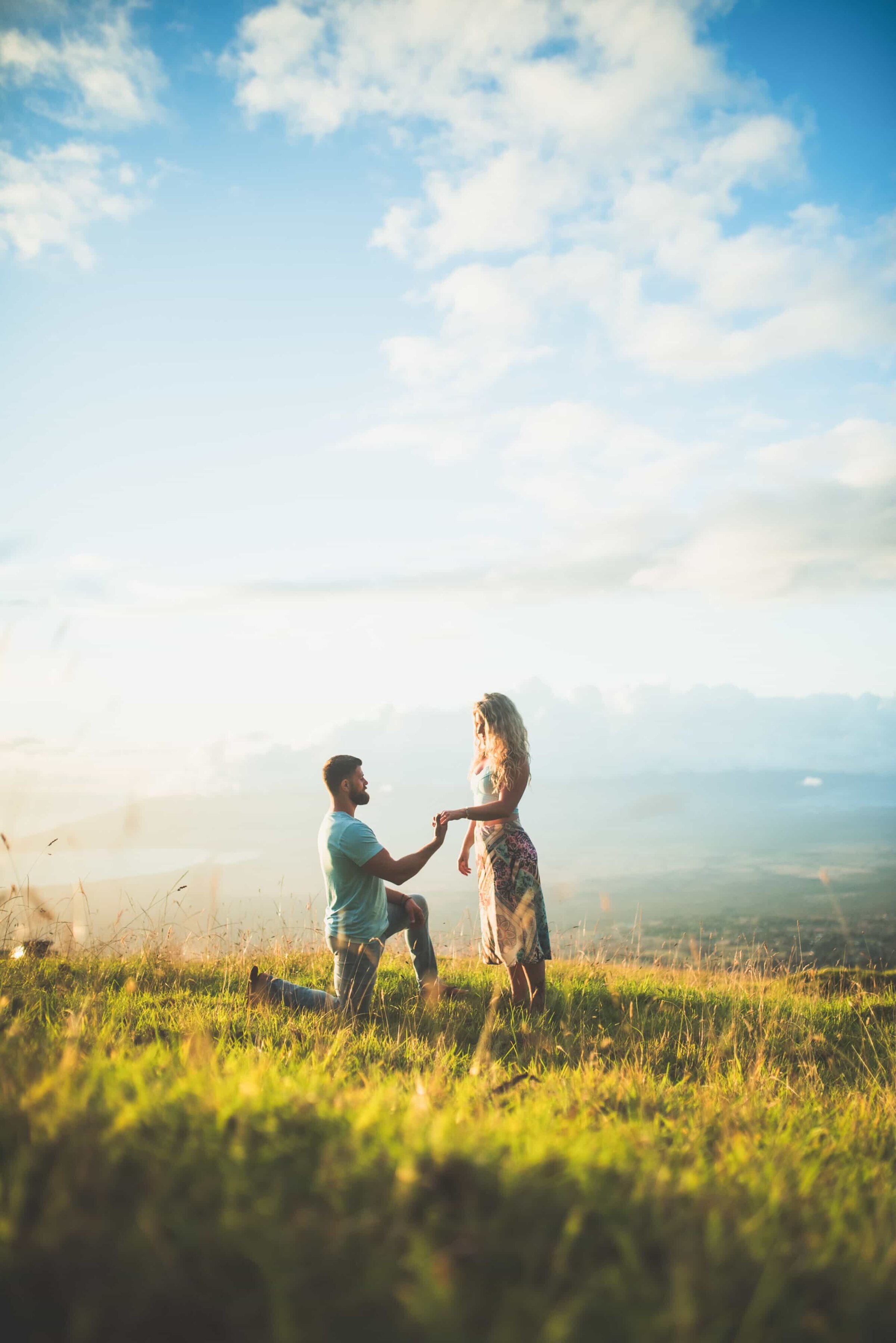 Proposal on Upcountry hillside Man proposing on an Upcountry Maui hillside with a valley view