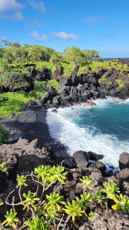 Photo Session Location — Punaluʻu Black Sand Beach, Big Island Hawaii Dramatic black sand beach with lava rocks and crashing waves at Punaluʻu on the Big Island of Hawaii