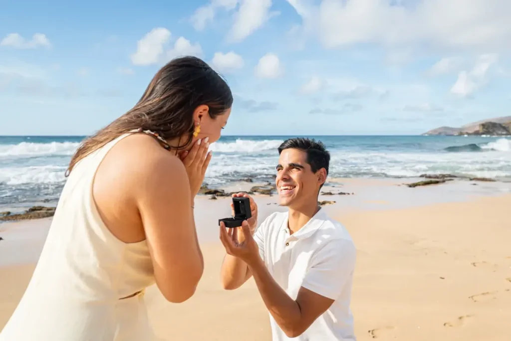Couple getting engaged at Mākena Cove Maui, one of the best places to propose in Hawaii